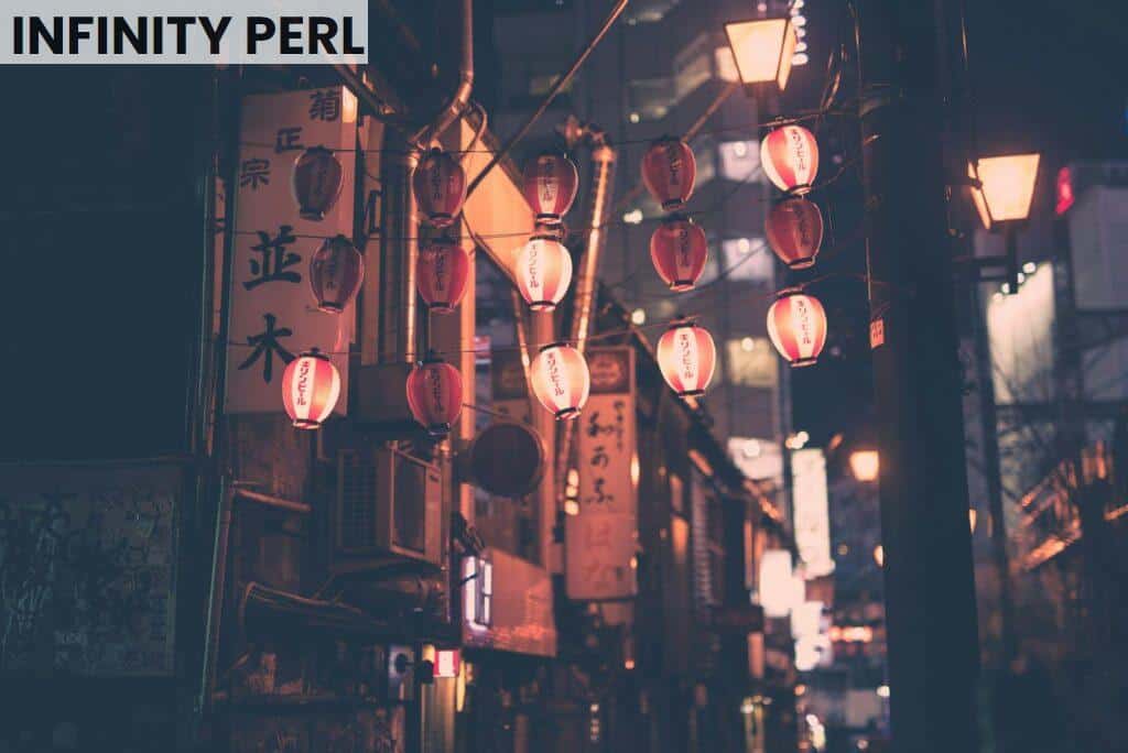 Moody night street with red lanterns in Tokyo Japan, capturing urban charm and cultural essence.
