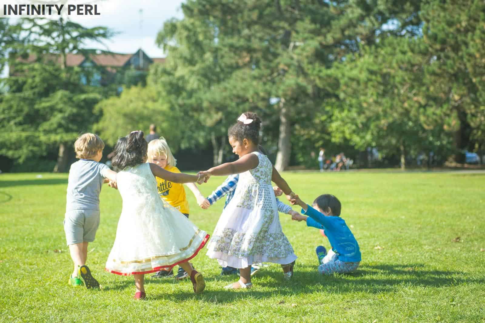 woman in white dress dancing with girl in white dress on green grass field during daytime